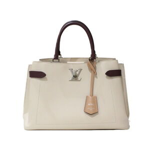 Louis Vuitton Lock Me Day grained calfskin leather handbag Off-White strap